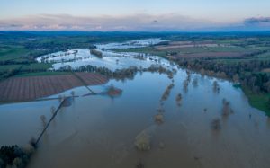 Image of flooding across fields and vegetation