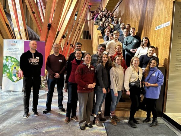 The whole CircHive team of around 50 people standing in a stairwell