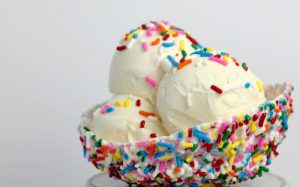 Bowl of vanilla icecream with sprinkles