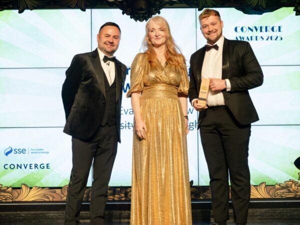 Sam Evans Net Zero Challenge winner with Nikki Flanders of SSE and Adam Kosterka from Converge