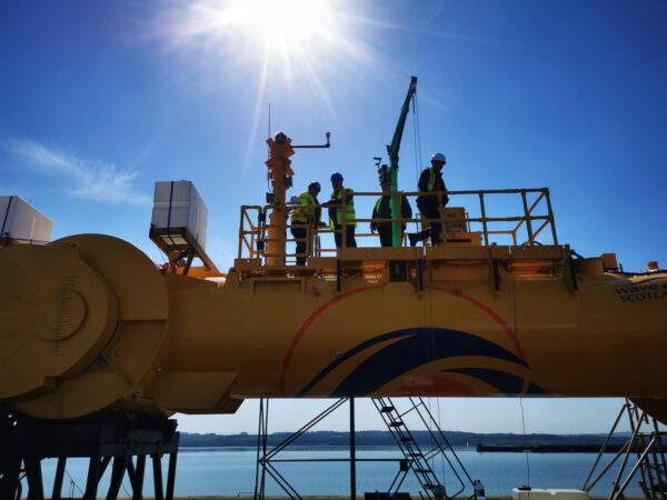 The CGEN team on Mocean Energys Blue X wave converter Credit Mocean Energy